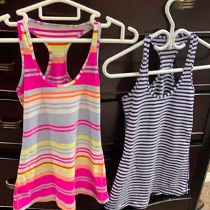 MOVING!!! 2 lulu tanks!!! Size 6